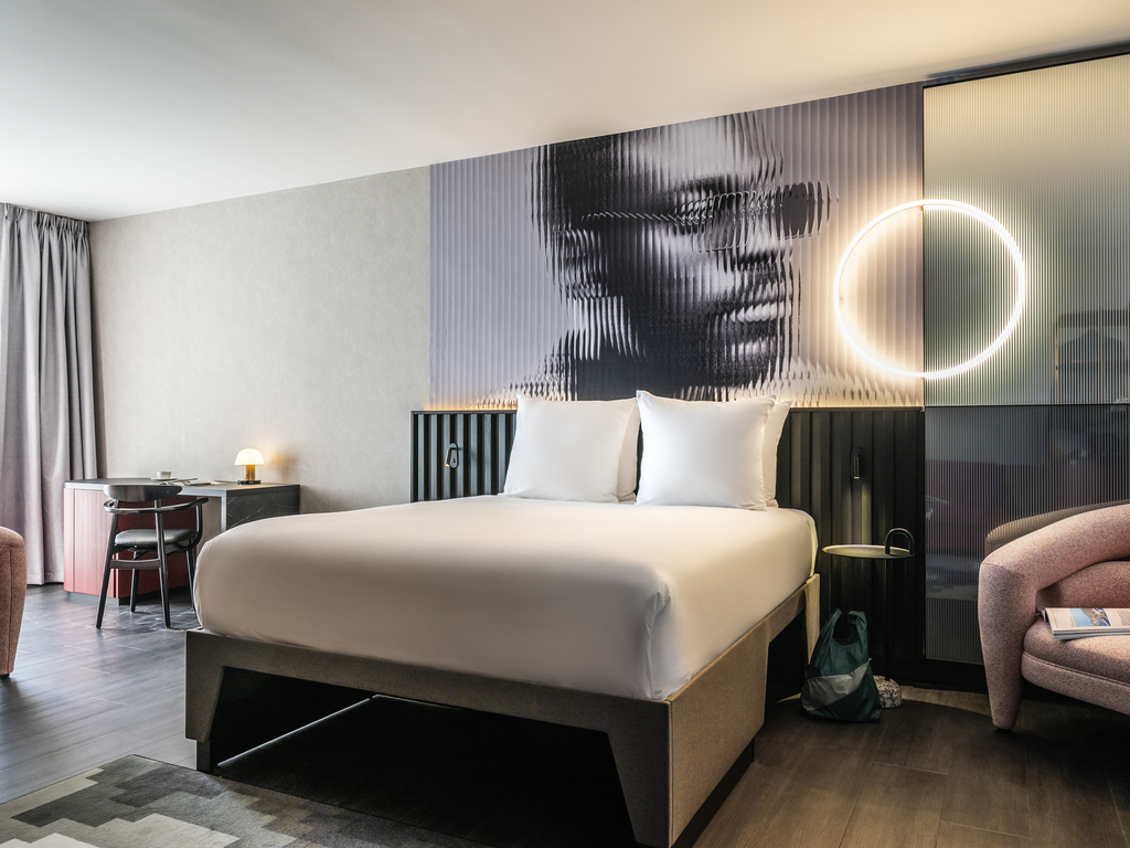 Deluxe Room with 1 queen bed and 1 double sofa bed